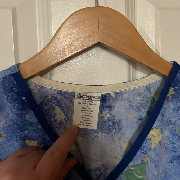 Two gently used women’s size large winter themed scrub tops - Picture 6 of 7